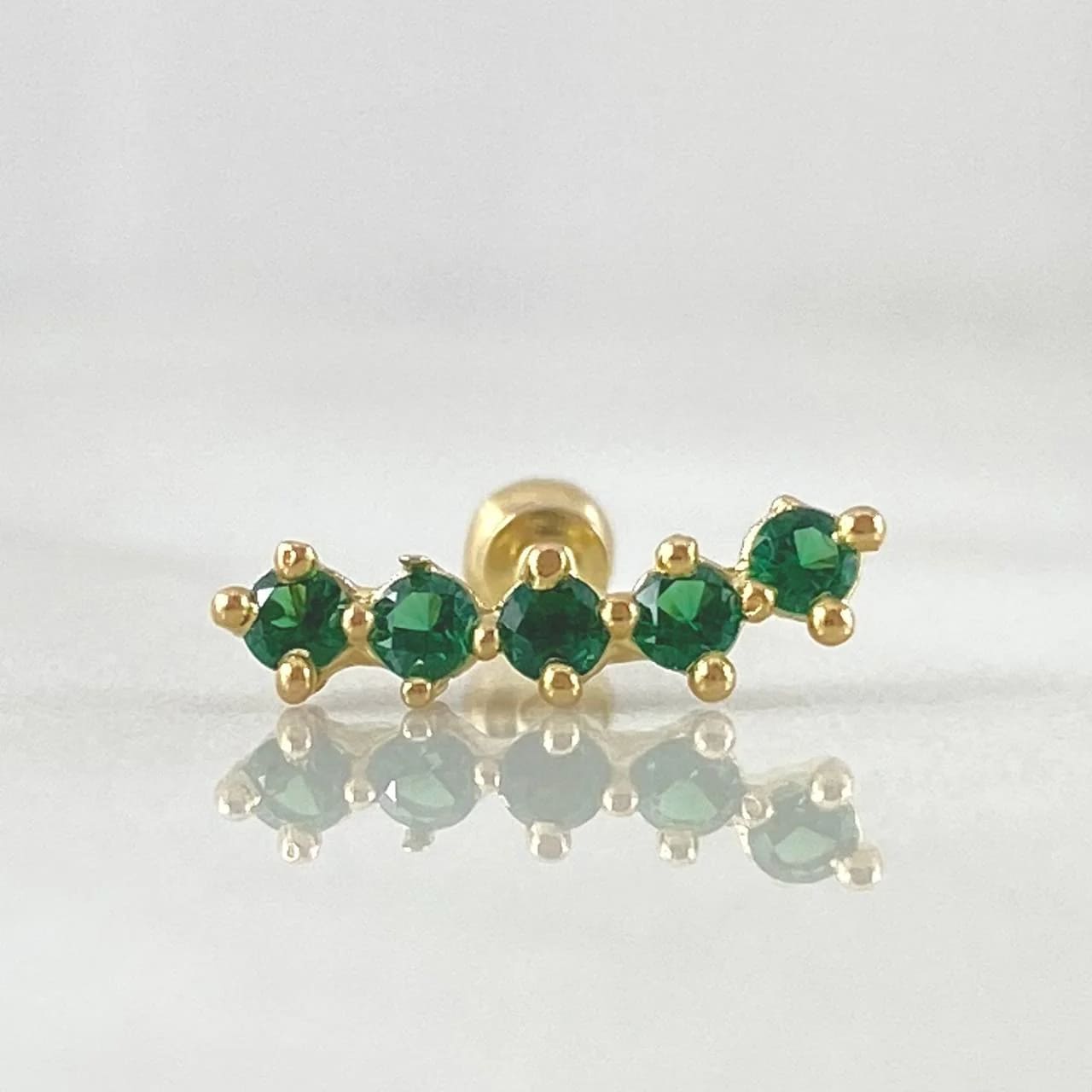 18K Yellow Gold “Arco” Curved Piercing with Green Zircons and Ball-Thread Closure – 0.6g, 1.2cm